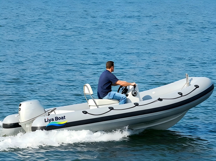 Liya 17ft open deck RIB boat with a durable fiberglass hull on water.